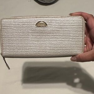 Nina Ricci cream colored wallet